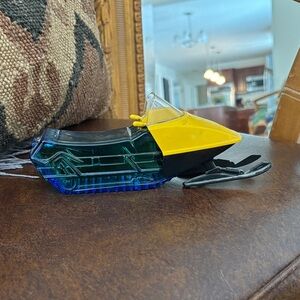 Avon Yellow and Black Snowmobile with Blue Accents